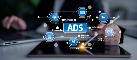 A professional exploring digital marketing strategies through ads and social media, utilizing a tablet to enhance business growth and online presence. Tessel