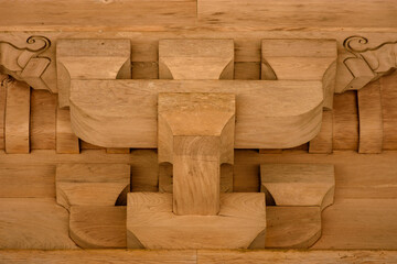 Intricate wooden architectural detail showcasing traditional craftsmanship of Japanese roof beams