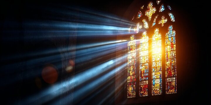 Sunlight Streaming Through Stained Glass Window Illuminates Church Interior, Inspiring Reflection