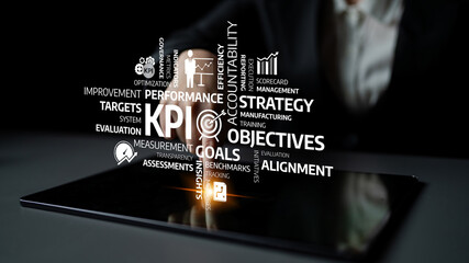 A professional business environment featuring a hand interacting with a tablet displaying key concepts related to performance metrics and strategic objectives, focusing on improvement. Tessel
