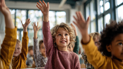 A group of diverse, smiling elementary school kids eagerly raising their hands, showcasing classroom participation and enthusiasm.
