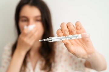 Woman Showing Thermometer