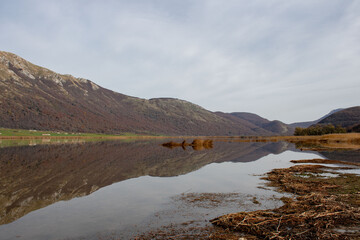 mountain landscape with lake and mountains
