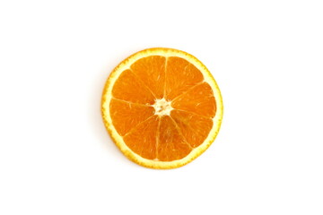 There is a round orange slice on a white background.	