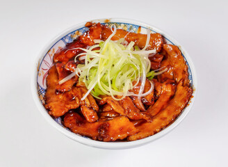 Japanese pork bowl, a delightful culinary experience for lunch or dinner. Delicious, visually appealing.