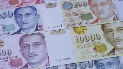 Money, currency of Singapore, dollar banknotes of various denominations. Singapore money as a financial background for your design
