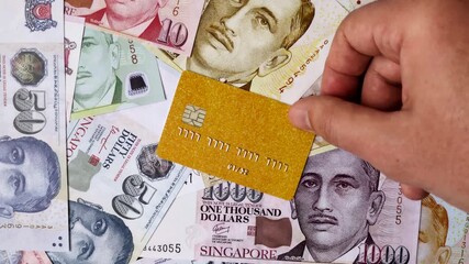 A credit card for contactless cashless payments via a terminal or online. A credit card for a financial background - Powered by Adobe