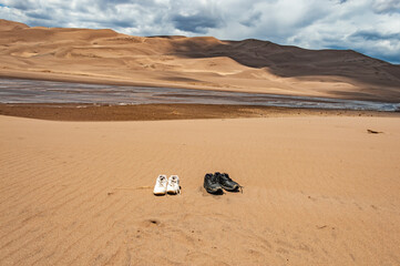Shoes left on sand... Great Sand Dunes National Park, Colorado