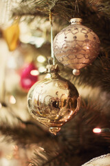 Vintage christmas tree ornaments in warm holiday lights creating nostalgic festive atmosphere concept of antique decor concept of home styling concept of holiday crafts