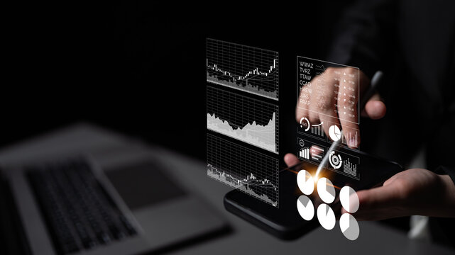 A professional analyzes digital graphs and charts on a touchscreen device, showcasing modern data visualization techniques for informed business decisions. Impute
