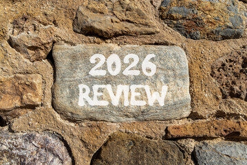 2026 Review symbol. Concept words 2026 Review on beautiful grey stone on stone wall. Beautiful stone wall background. Business and 2026 review concept. Copy space.