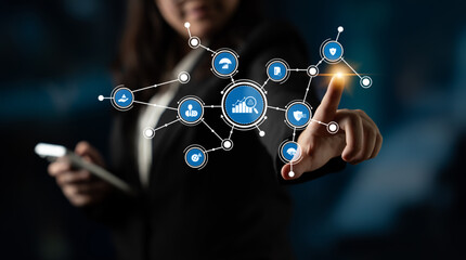 A business professional engages with a digital interface representing technology symbols and data metrics, showcasing modern business strategy and innovation. Tessel