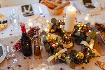 A table set for dinner meal at Christmas time.