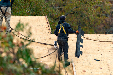 Multifamily dwelling roof replacement with a shallow depth of field