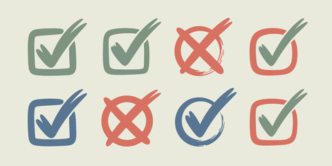A collection of check marks and x marks in various colors and styles on a light background surface