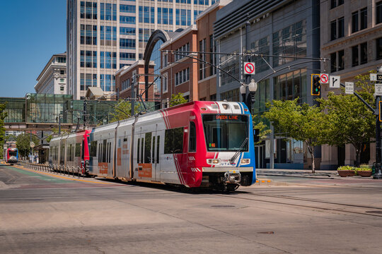Salt Lake City, UT, US-August 6, 2025: Light rail train or trolley called TRAX on downtown street. This is the public transportation system for the city of Salt Lake.