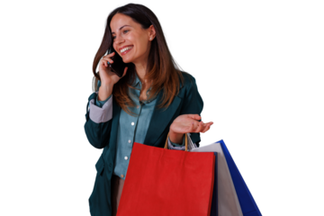 Woman shopping, smiling and talking on smartphone, holding retail bags after making purchases, happy consumerism