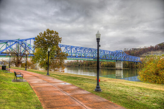 Ashland River Trail Along the Ohio River. The Ashland Kentucky Riverfront Trail  follows the Ohio River to the Simeon Wills Memorial Bridge on a cloudy autumn morning. 