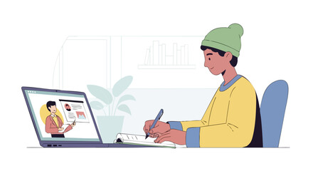 Young male student attending a virtual lecture or class on a laptop and diligently taking notes in a notebook.