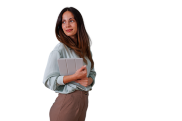 Confident businesswoman holding a tablet, looking away and smiling, standing with technology and modern communication tools