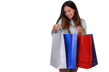 Woman smiling and holding multiple colorful shopping bags, feeling happy after a day of buying