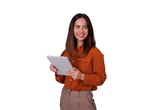 Young adult woman holding a tablet, smiling and looking away, showcasing technology, productivity, and success