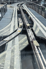 Automated guideway transit system tracks converging at a junction