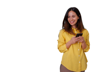 Young woman smiling, engaging with her mobile phone, experiencing joy while using social media or sending messages