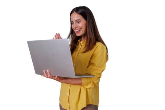 Woman waving and smiling during video call on laptop representing remote communication and virtual interaction