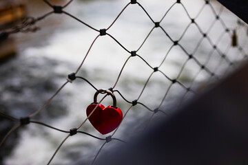 red heart on the fence