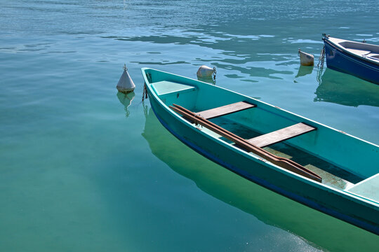 Pleasure launch boat in turquoise lake water