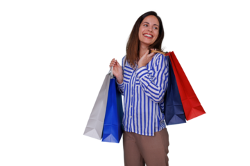 Woman standing with multiple shopping bags, smiling and looking away, enjoying the shopping experience. Transparent background