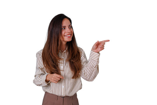 Elegant business woman smiling and pointing finger offering information, presenting ideas, or indicating direction