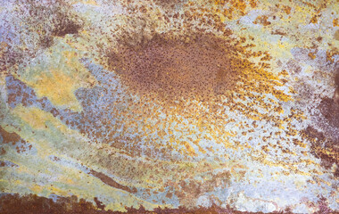Textured surface of rusted metal brown orange yellow patinas. Irregular patterns speckled oxidation rough uneven texture. Corrosion over time.