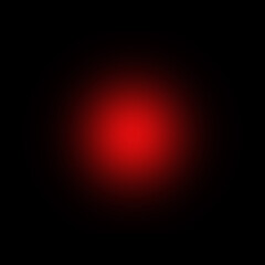 Soft glowing red light in the center of a dark black background, creating a dramatic atmospheric gradient ideal for abstract designs, digital art, and graphic overlays.