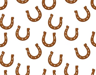 A seamless pattern of brown horseshoes with white dots.