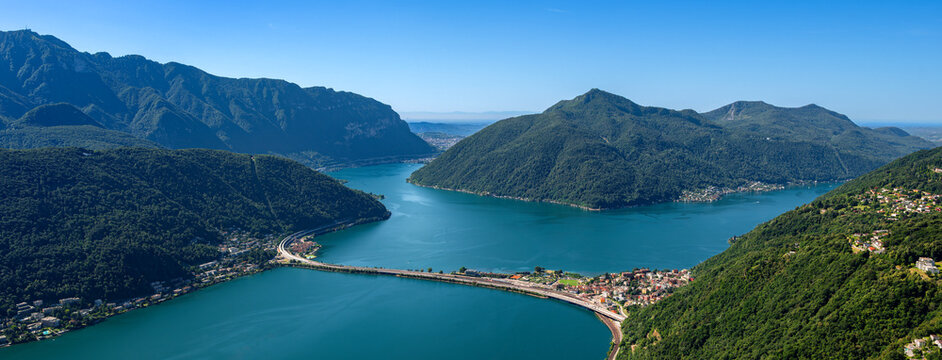 Scenic viewpoint overlooking a lake Lugano and mountains