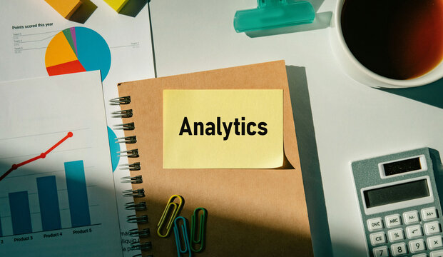 There is sticky note with the word Analytics. It is as an eye-catching image.