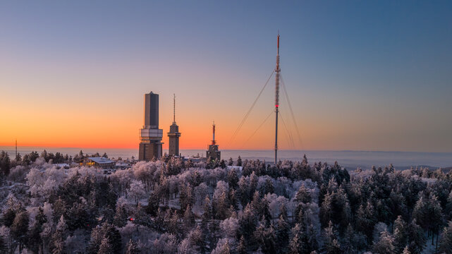 Aerial view of Grosser Feldberg covered in snow during sunset