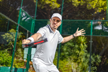 Padel player at outdoor court. Open social tour template. Mockup for social media events with copy space.