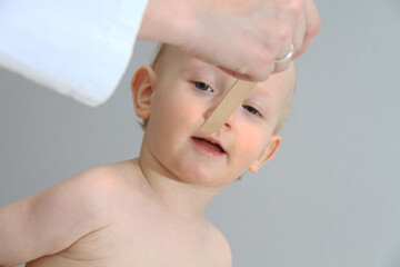 Baby at Routine Checkup With Pediatric Specialist