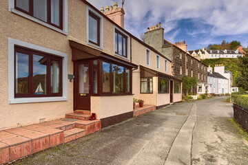 Terraced houses along Beaumont Cres, a private street running along the west side of the harbor closed to through traffic. Portree-Skye-Scotland-089