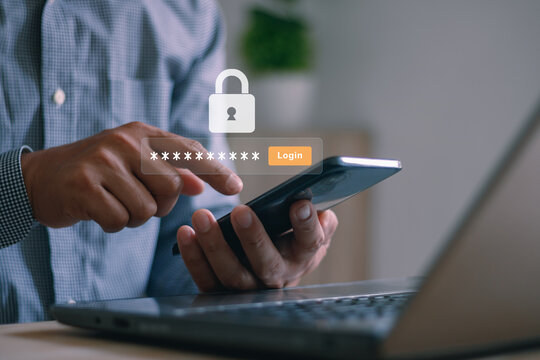 Cyber security, Secure internet access concept. Hand holding a smartphone to login username password on screen. Data privacy online protection on mobile phone application with 2FA increases security.