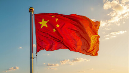 Chinese flag waving in the wind under bright sunlight, symbol of national pride, unity, identity, and China’s cultural significance captured in vivid detail
