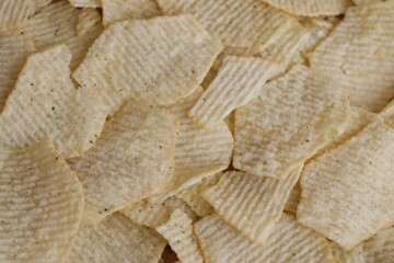 Homemade Flavored Paprika Potato Chips in a Bowl, top view. Flat lay