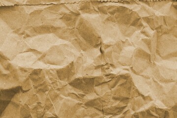 Brown crumpled recycled paper texture background. Kraft Paper