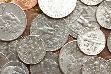 Pile with big amount of silver american cent coins as United States currency