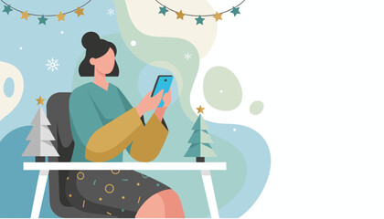 Woman uses phone at desk surrounded by festive winter decorations