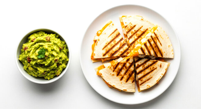 Delicious quesadillas with fresh guacamole on a white background