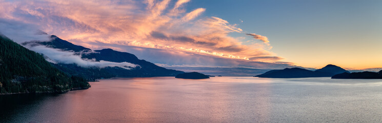 Sunset Over Howe Sound With Mountains And Islands In Calm Water, BC
